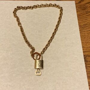 Luxurious Gold-Tone Necklace with Padlock Pendant